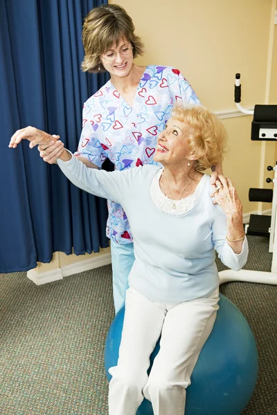 Physical Therapist Helps Senior Woman