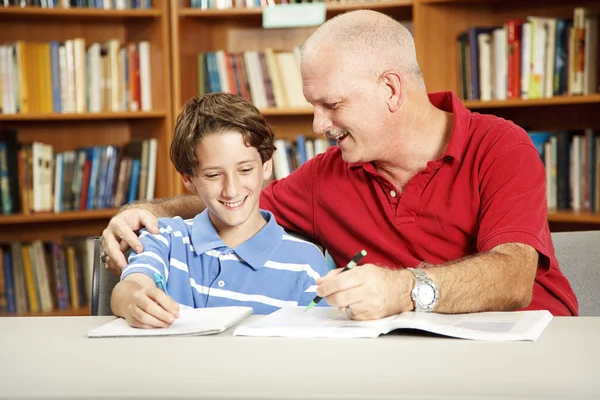 Father and Son in Library