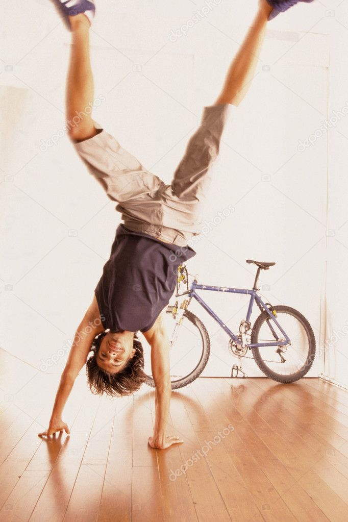 man doing cartwheel
