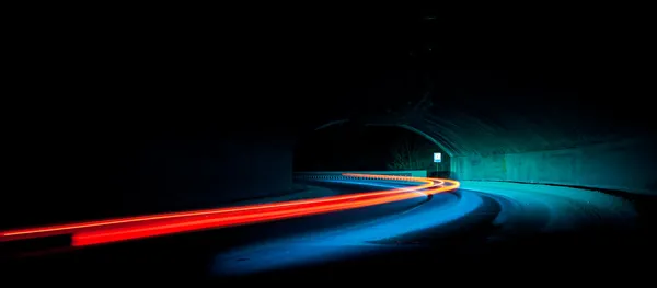 Car light trails in the tunnel
