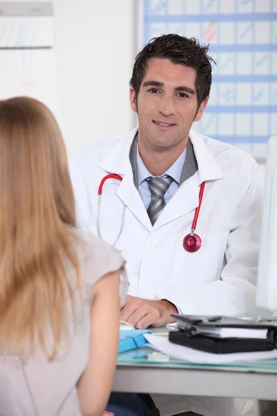 Male doctor in appointment
