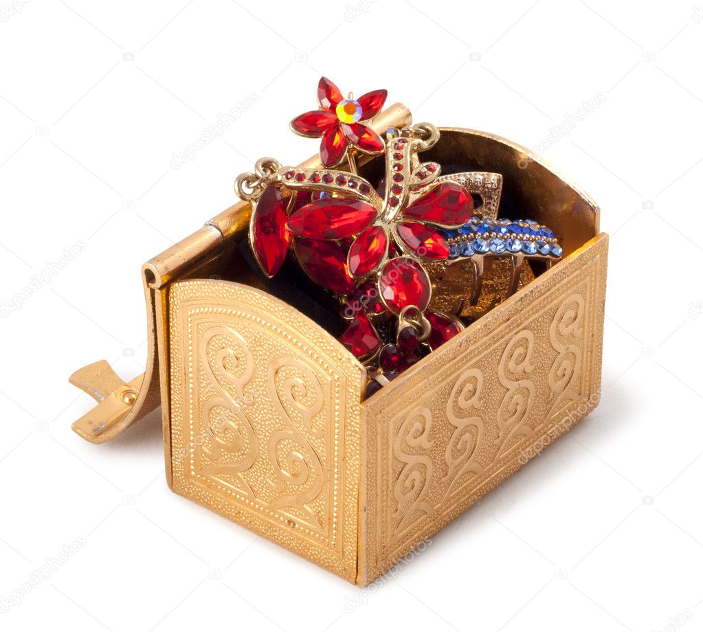 Gold metallic box with jewelry - Stock Image