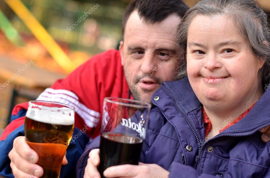 http://static7.depositphotos.com/1211672/745/i/950/depositphotos_7459150-Down-syndrome-couple-drinking.jpg