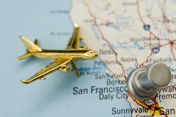 Plane and Thumbtack Over California