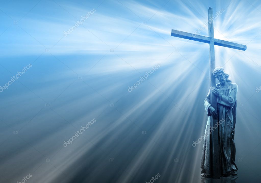 Jesus holding a cross on blue background - Stock Image