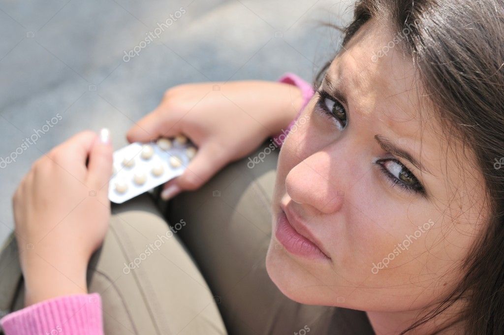 Girl Taking Pills