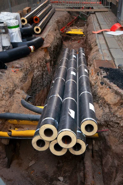 Pipes in dug up street