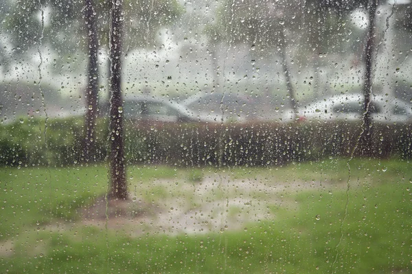 Glass window in rain storm