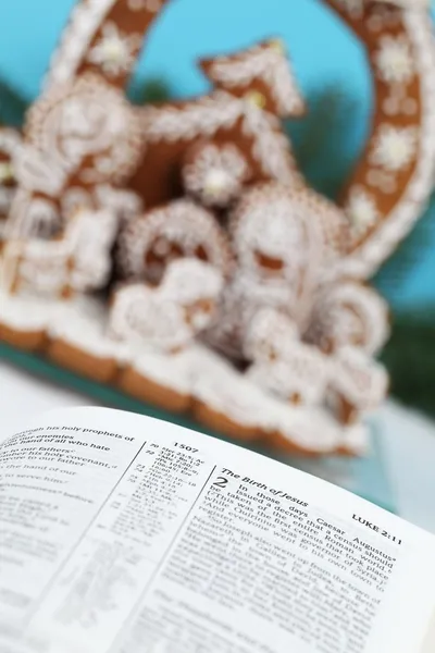 Bible and Gingerbread Nativity scene