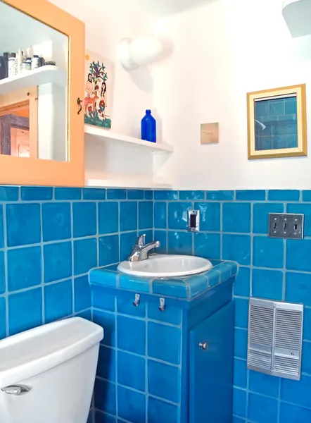 Turquoise tile work in a bathroom