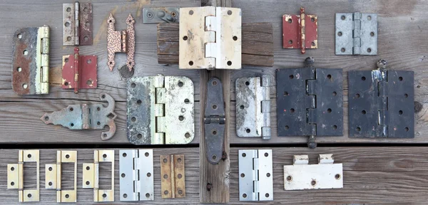 Weathered old hinges to be reused