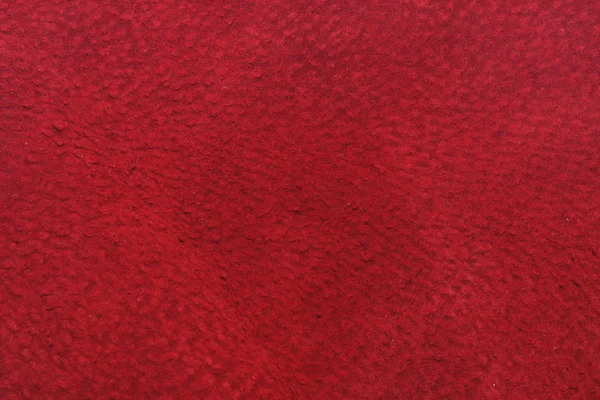 The texture of the red suede