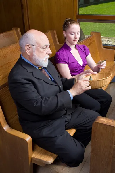 Older White Man Young Woman Donating Money Church Offering Baske