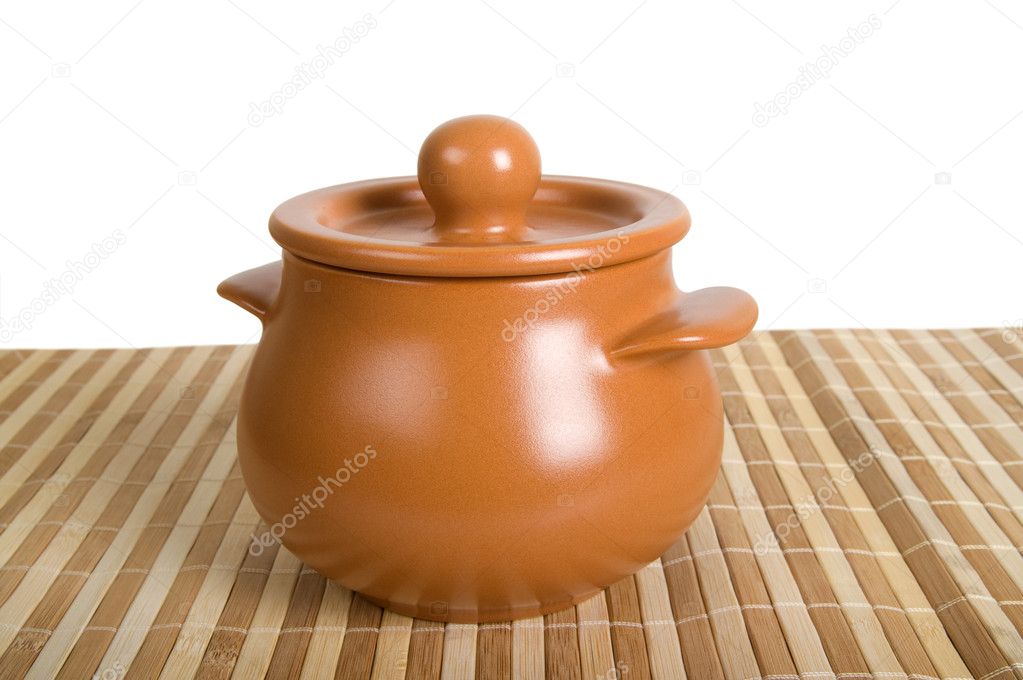 Clay pot on the striped mat