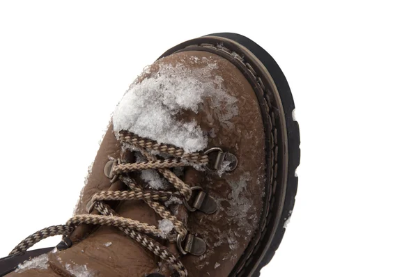Snow-covered hiking boot — Stock Photo, Image