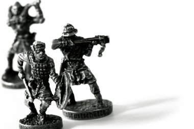 Toy soldiers in battle over white with shadow clipart