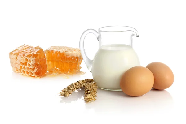 Fresh milk, two eggs and honey — Stock Photo, Image