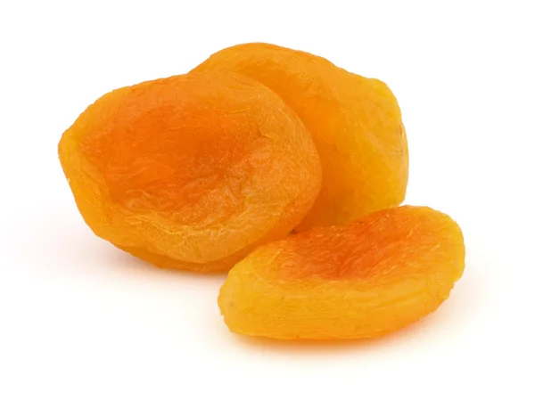 Torkade aprikoser på en vit bakgrund — Stockfoto