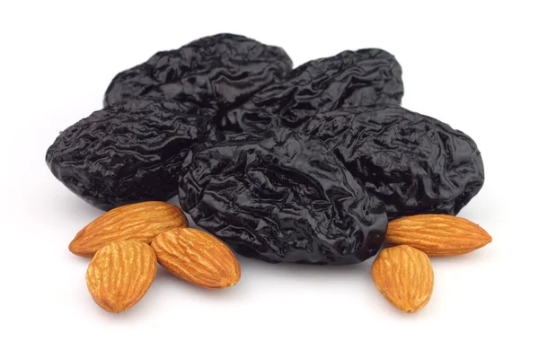 Dried prunes with almonds — Stock Photo, Image