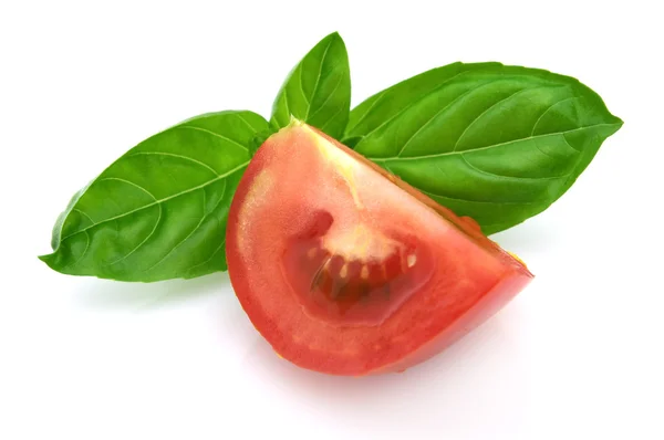 Tomato with basil — Stock Photo, Image