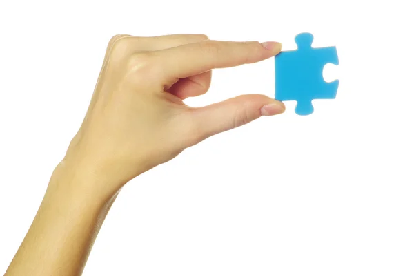 Puzzle na mão — Fotografia de Stock