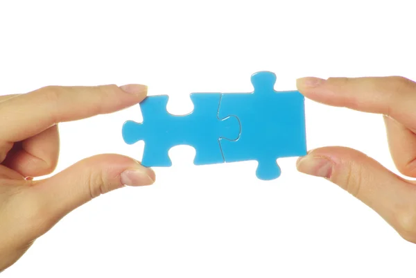 Puzzle na mão — Fotografia de Stock