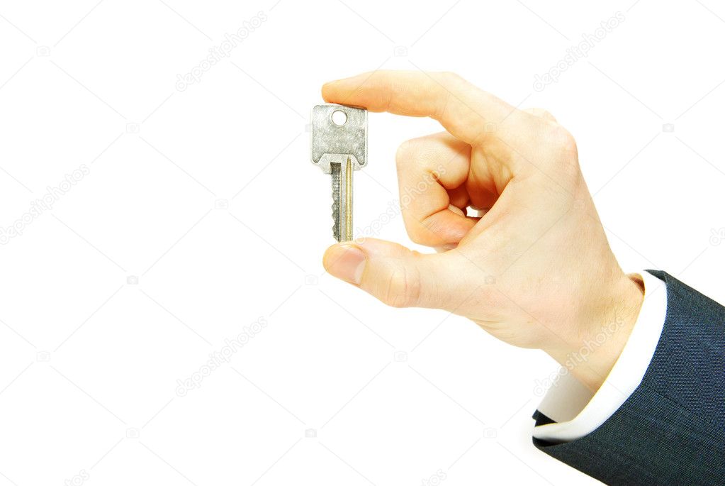 Hand holds a key