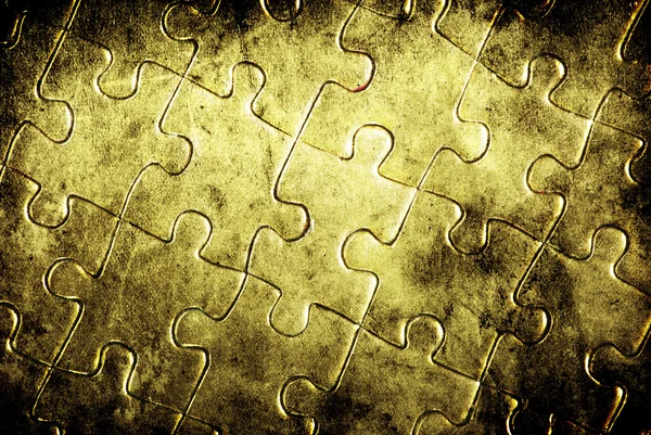 Gold puzzles — Stock Photo, Image