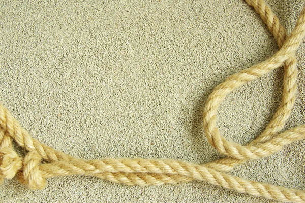Rope on sand — Stock Photo, Image