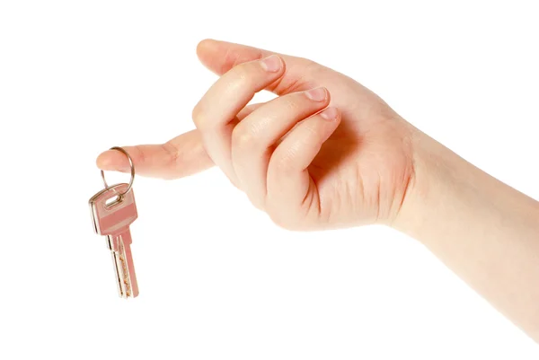 Mão segura uma chave — Fotografia de Stock