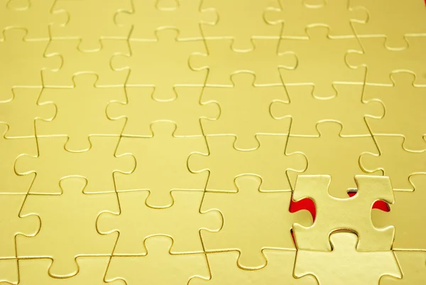 Gold puzzles — Stock Photo, Image