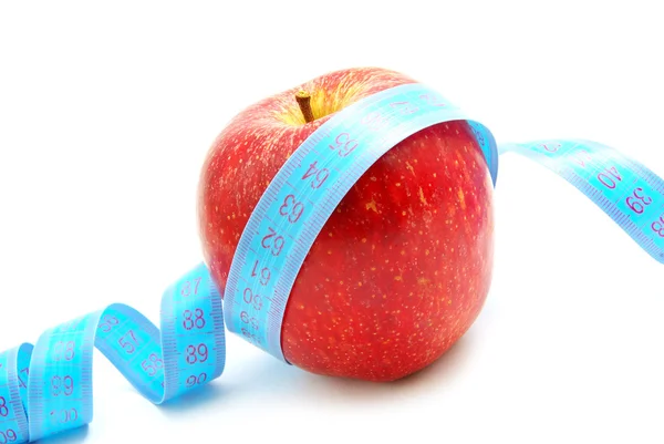 Apfel und Maßband — Stockfoto
