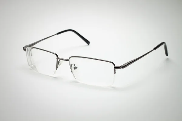 Glasögon på grå bakgrund — Stockfoto