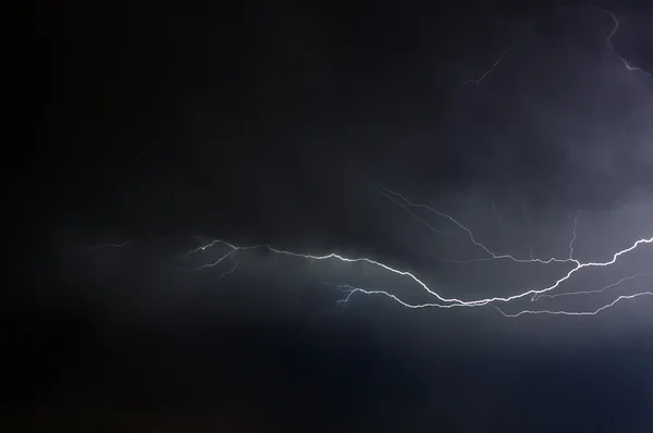 stock image Lightning strike in the darkness