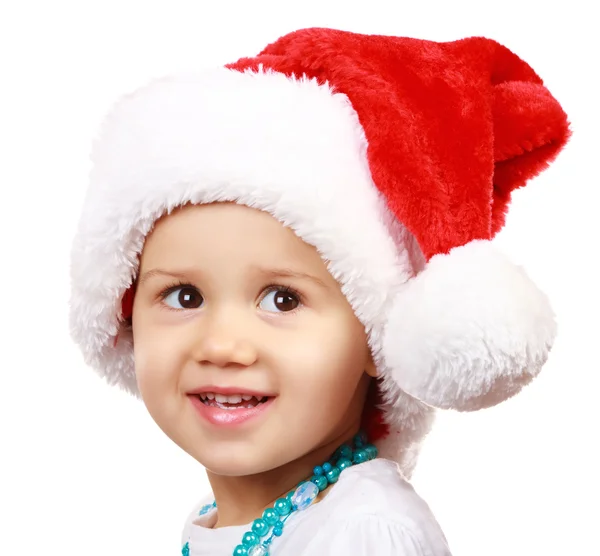 Bébé en chapeau de Père Noël sur fond blanc Image En Vente