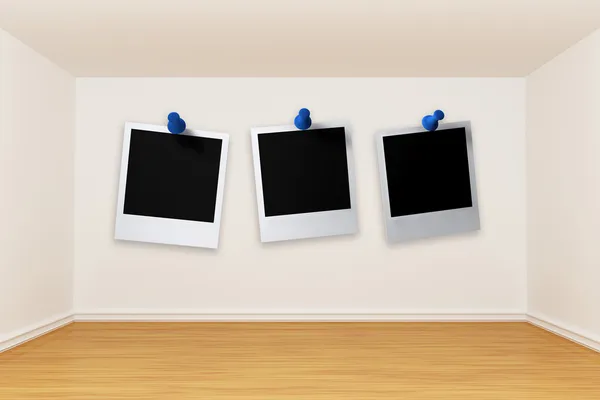 Room with instant photos frames — Stock Photo, Image