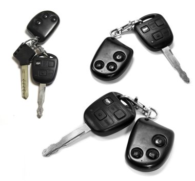 Car keys with remotes on white background clipart