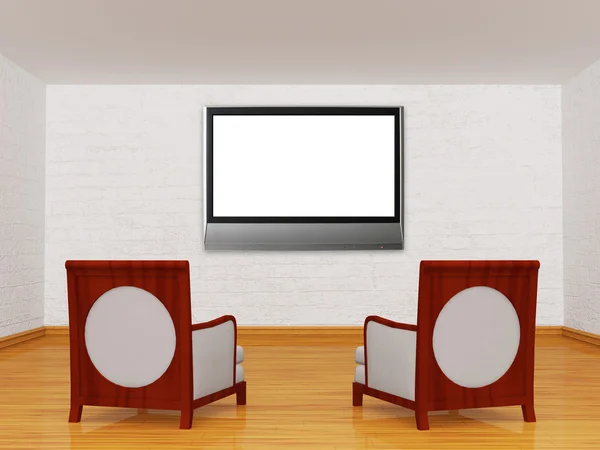 Duas cadeiras de luxo com tv lcd na galeria — Fotografia de Stock