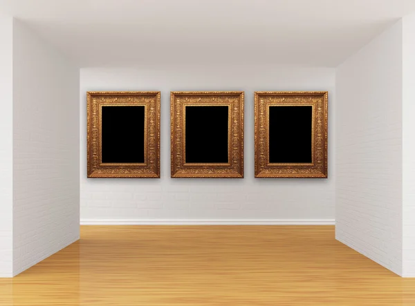 Room with empty picture frames — Stockfoto