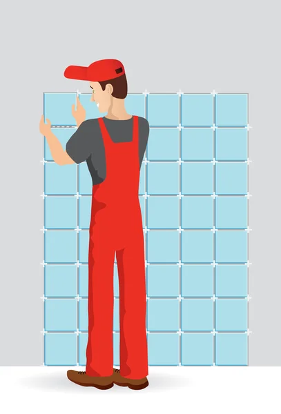 Man tiling a wall in the room — Stock Photo, Image
