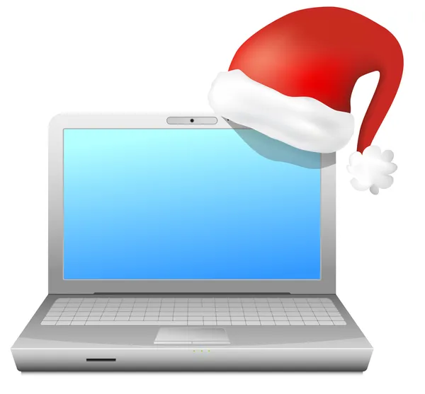 Laptop com chapéu de Papai Noel — Fotografia de Stock