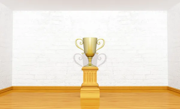 Golden trophy cup on the pedestal in room — Stock Photo, Image