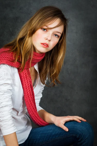 Girl with a red scarf — Stock Photo, Image