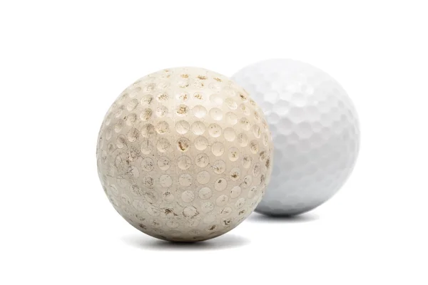 Old and new golf ball — Stock Photo, Image