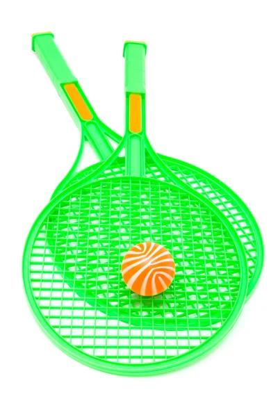 Зелена ракетка і м'яч — стокове фото