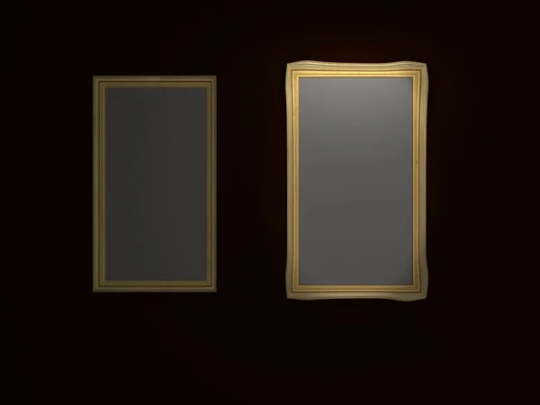 Золотая картинка на темной стене — стоковое фото