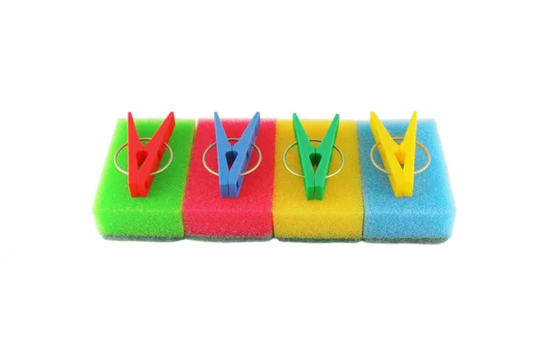 Color sponges and clothes-pegs — Stock Photo, Image