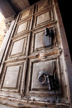 Ancient door of the church of the Holy Sepulcher, Jerusalem clipart