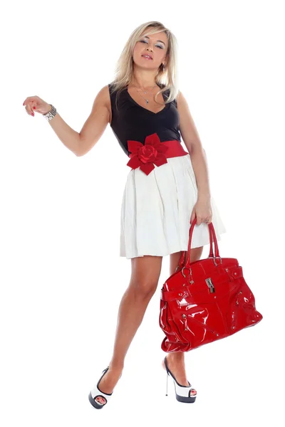 Mode junge Frau mit roter Tasche isoliert auf weiß — Stockfoto