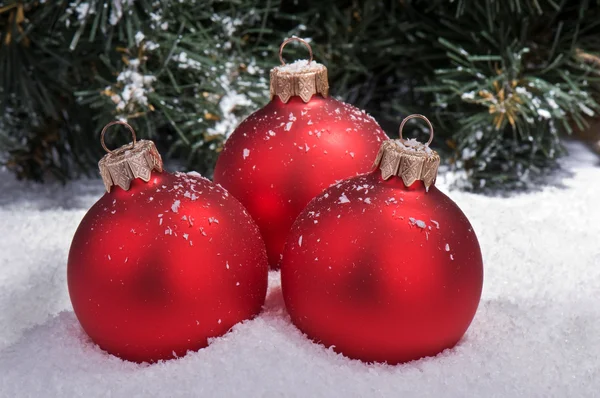 Christmas spheres on snow — Stock Photo, Image